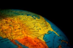 Spinning globe with dark background, showing uSA