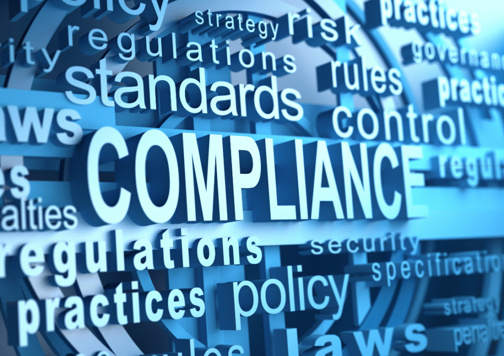 Multiple words o a blue background including compliance standards regulations policy amongst others