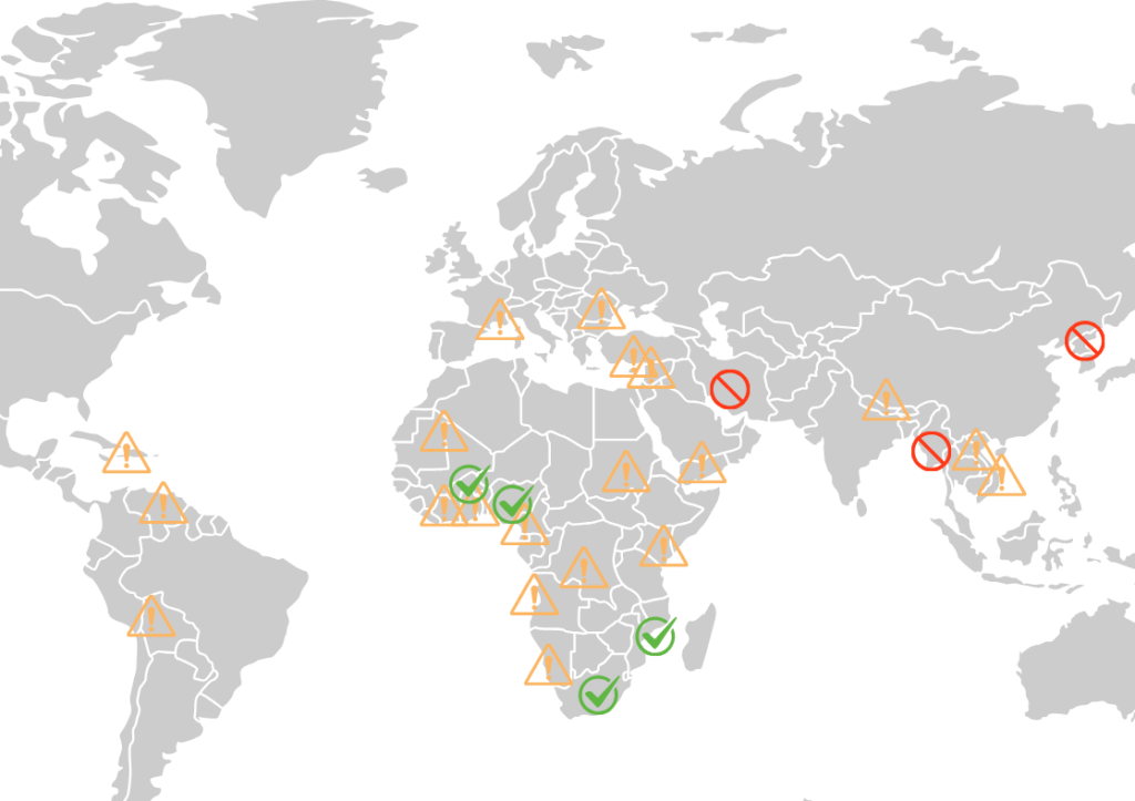 Map of the world with green ticks yellow alerts and red stop signs representing FATF grey and black lists