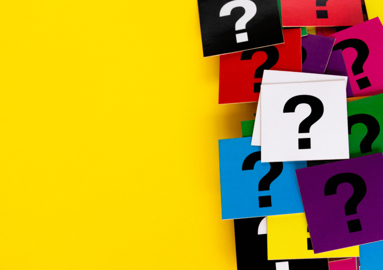 Colourful questionmarks set against a yellow backdrop