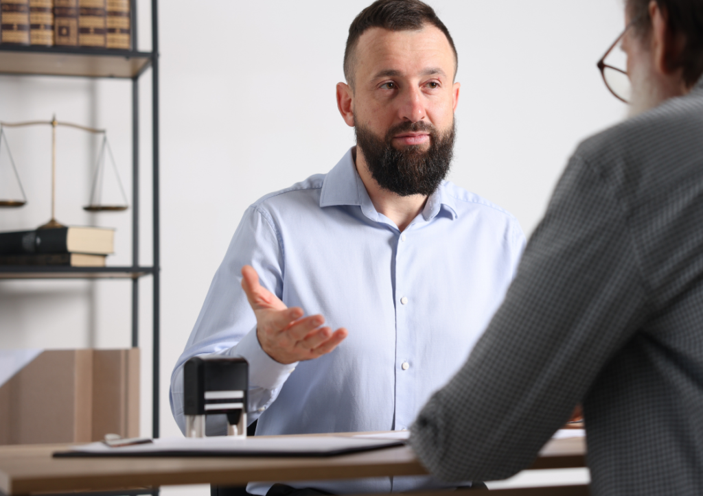 Solicitor advising client in office