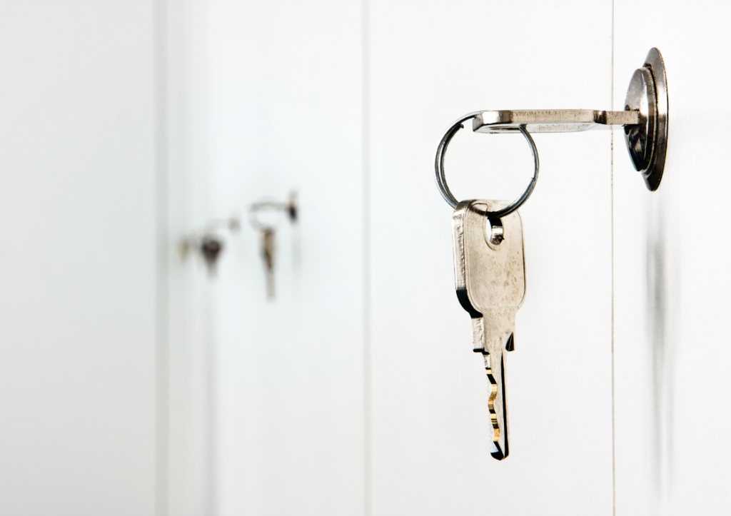 A key hanging from a filing cupboard suggesting legal privilege